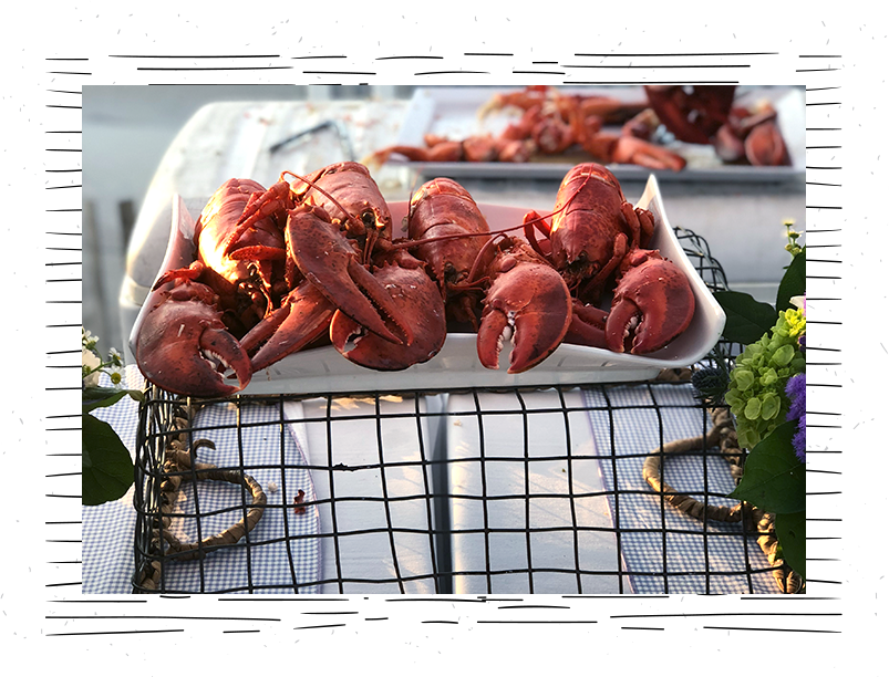 lobsters-sitting-on-a-plate-on-top-of-a-basket